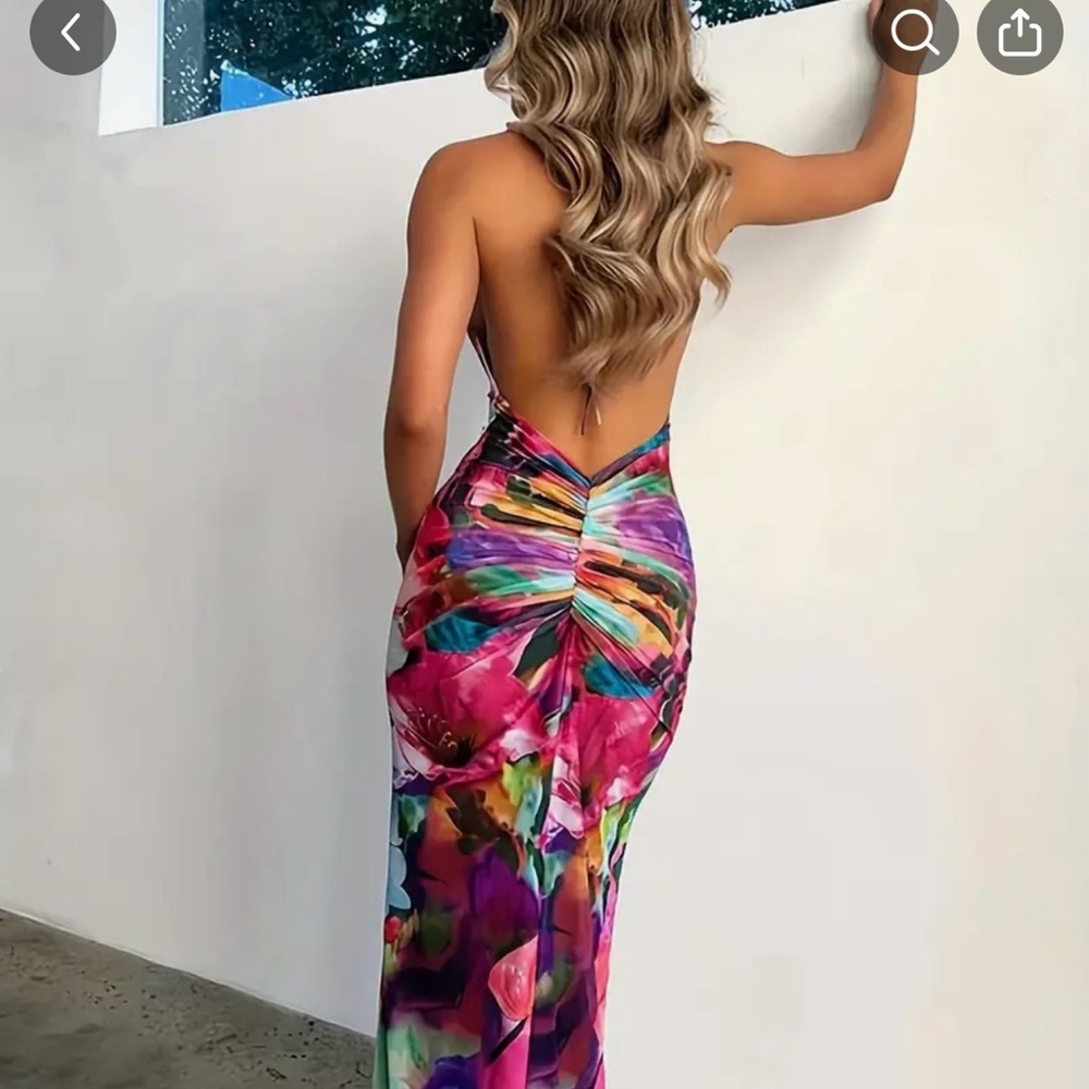 Sheer, floral backless dress. Worn once to try on. No flaws